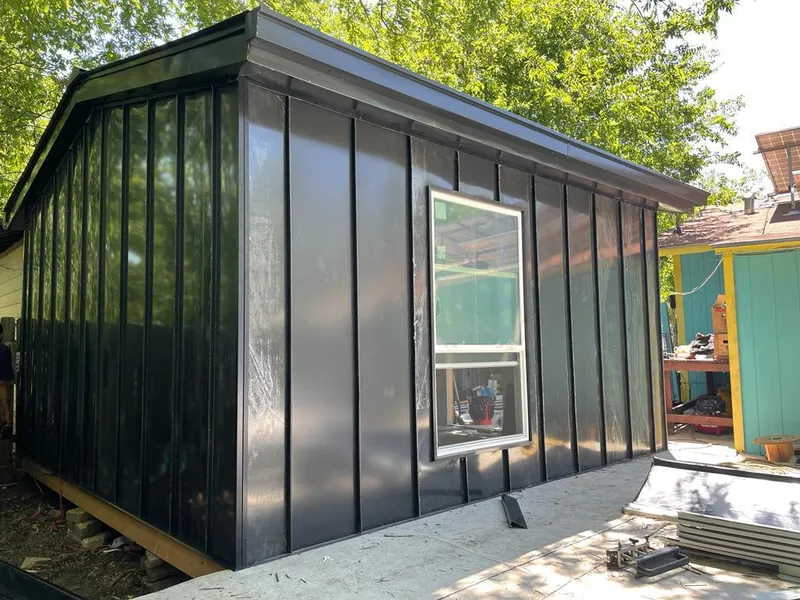 Black standing seam metal wall panels for Roof Inspection in Estero